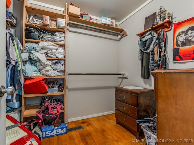 35575 W 87th Pl S, Mannford, OK 74044 - walk in closet with wood-type flooring and visible vents