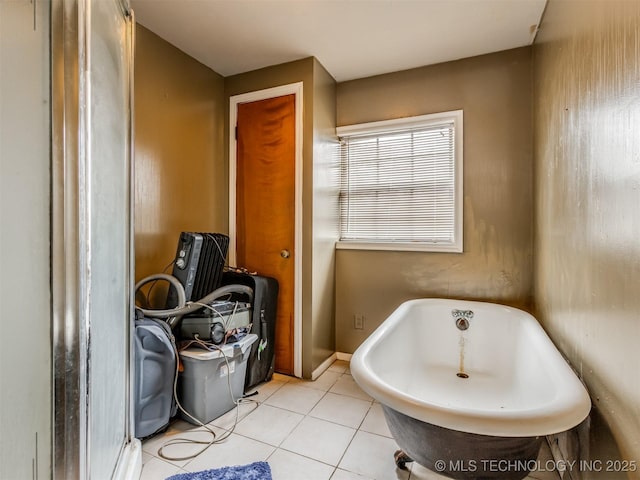 35575 W 87th Pl S, Mannford, OK 74044 - bathroom featuring a freestanding bath and tile patterned flooring