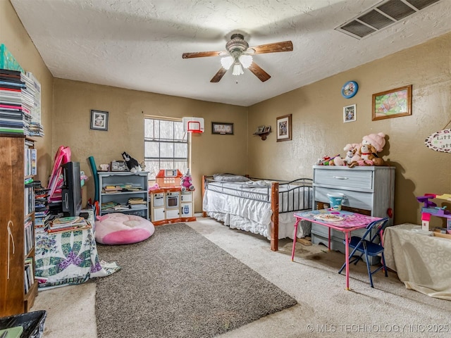 35575 W 87th Pl S, Mannford, OK 74044 - bedroom with visible vents, a textured ceiling, carpet, and ceiling fan