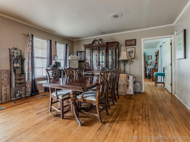 35575 W 87th Pl S, Mannford, OK 74044 - dining space featuring light wood-style floors, ornamental molding, and visible vents