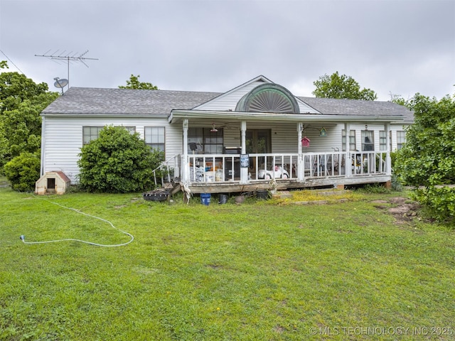 35575 W 87th Pl S, Mannford, OK 74044 - rear view of property with a lawn and a shingled roof