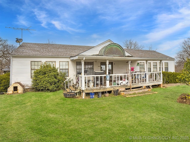 35575 W 87th Pl S, Mannford, OK 74044 - back of property with roof with shingles, covered porch, and a yard