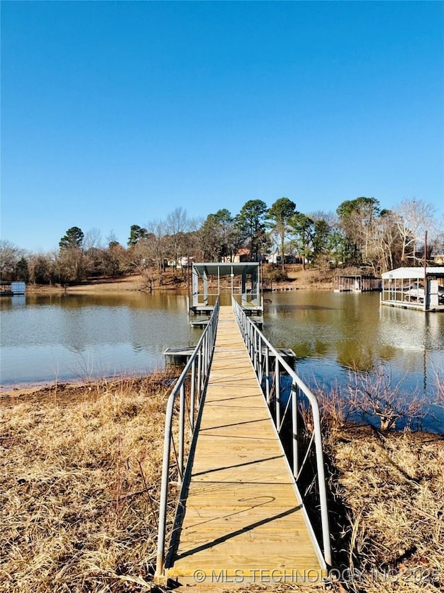 view of dock with a water view