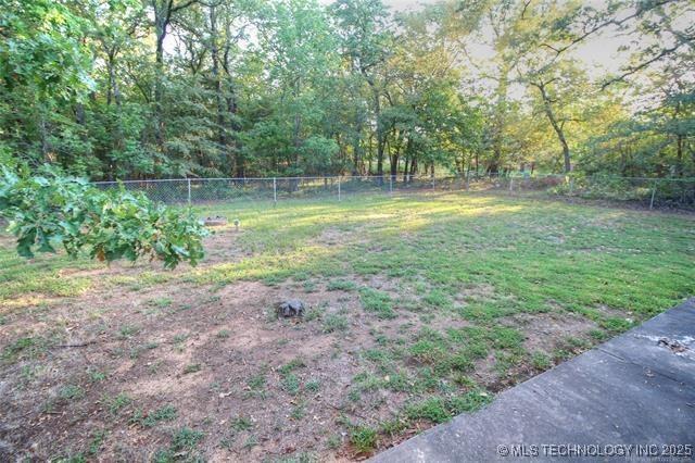 6786 Red Oak, Kingston, OK 73439 - view of yard with a fenced backyard