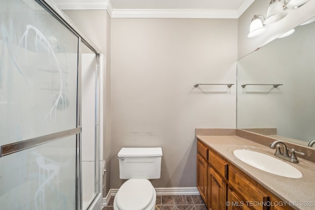 full bathroom with a shower stall, toilet, and crown molding