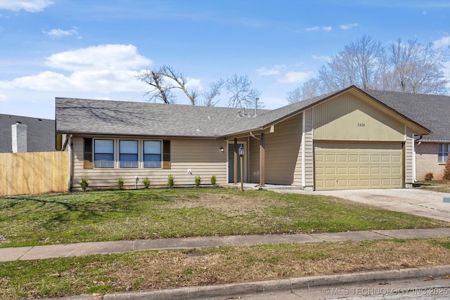 view of front of property featuring fence, concrete driveway, roof with shingles, a front yard, and an attached garage