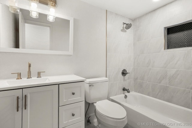 bathroom with toilet, vanity, and shower / tub combination