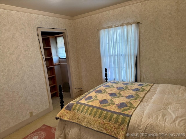 carpeted bedroom featuring multiple windows, wallpapered walls, and ornamental molding