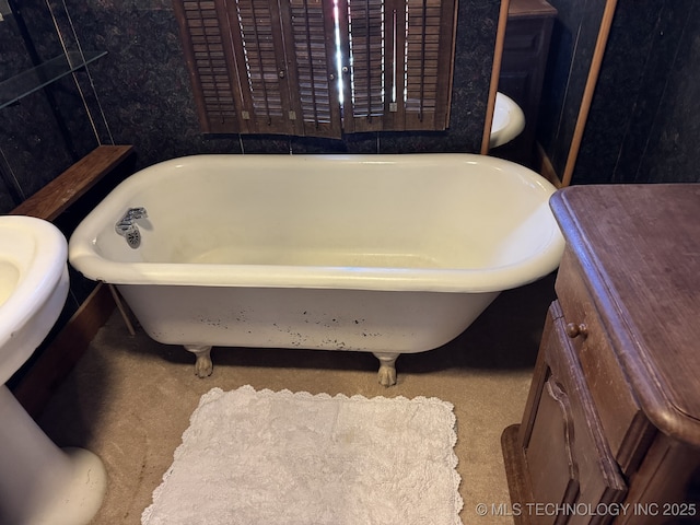 707 E 15th St, Okmulgee, OK 74447 - bathroom featuring a freestanding tub