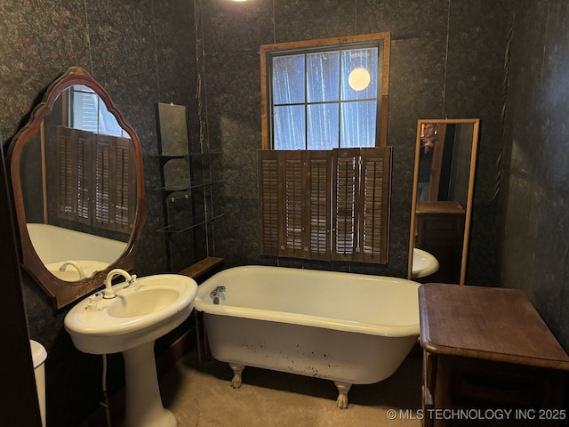 707 E 15th St, Okmulgee, OK 74447 - bathroom with a freestanding bath