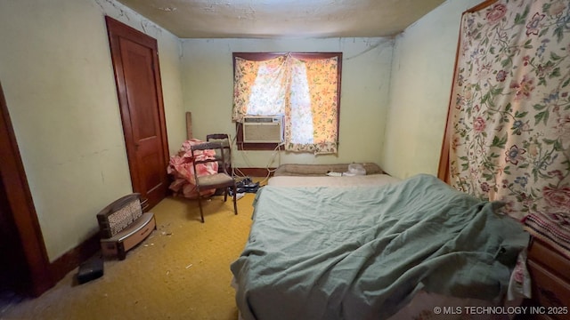 carpeted bedroom featuring cooling unit