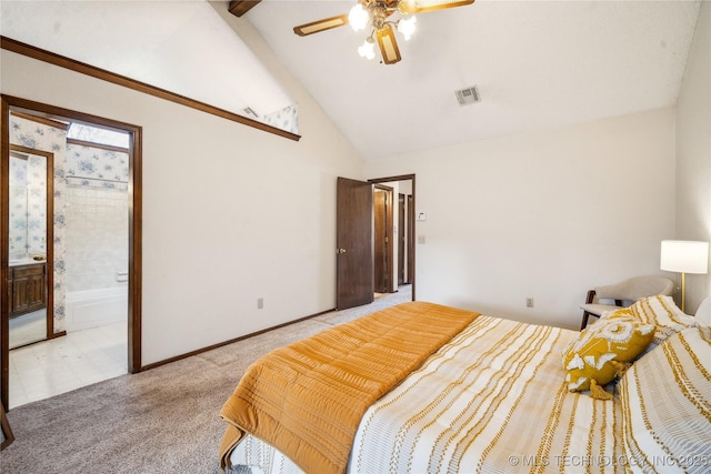 bedroom featuring visible vents, connected bathroom, carpet floors, baseboards, and vaulted ceiling