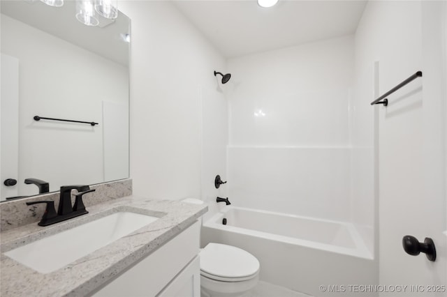 full bathroom featuring vanity, toilet, and  shower combination