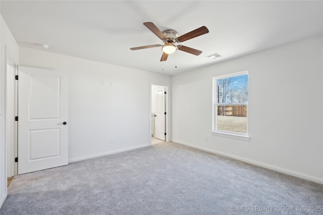 unfurnished bedroom with visible vents, ceiling fan, baseboards, and carpet floors