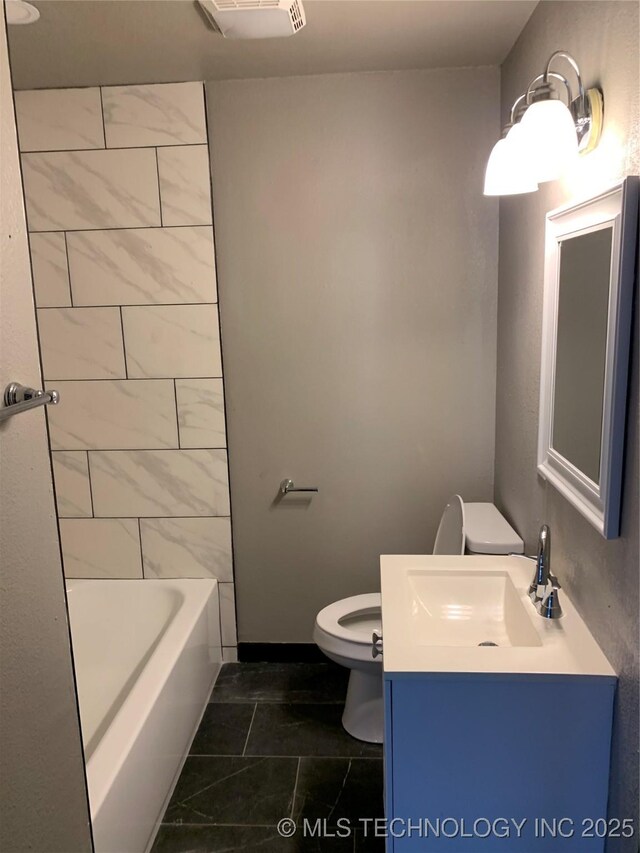 bathroom with visible vents, toilet, and vanity