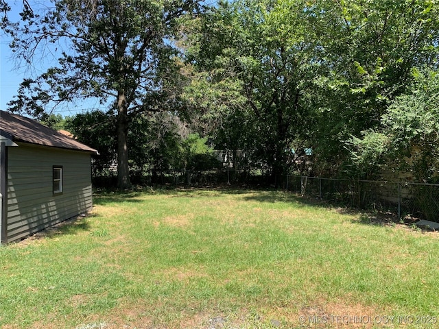 view of yard with fence