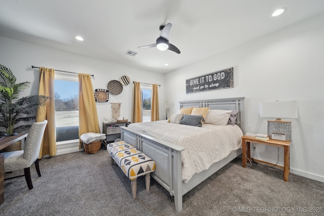 carpeted bedroom with recessed lighting, visible vents, and multiple windows