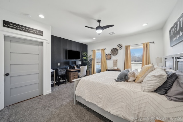 carpeted bedroom featuring recessed lighting, visible vents, and ceiling fan