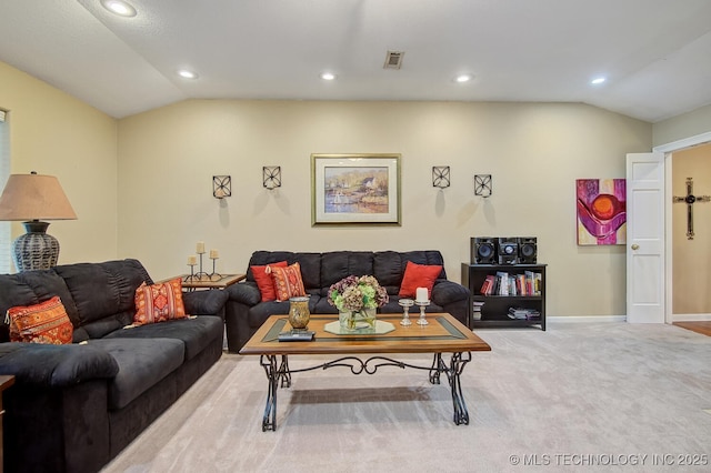 carpeted living area featuring visible vents, recessed lighting, baseboards, and lofted ceiling