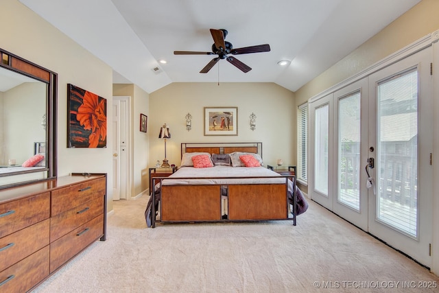 bedroom featuring light carpet, access to outside, french doors, ceiling fan, and vaulted ceiling