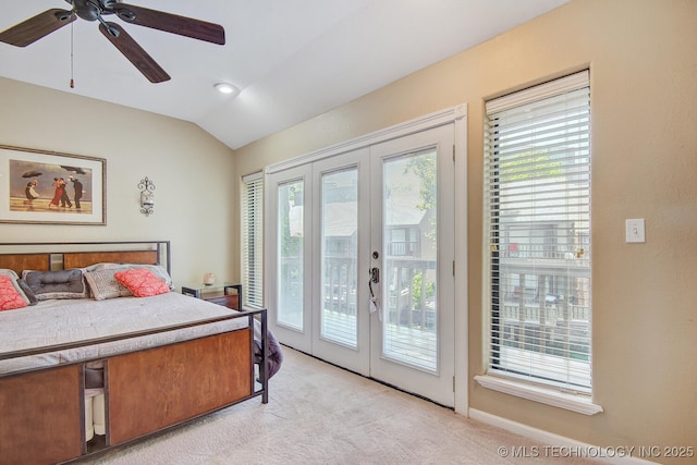 bedroom featuring access to exterior, ceiling fan, lofted ceiling, light carpet, and french doors