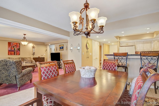 dining room featuring light tile patterned floors, a notable chandelier, and recessed lighting