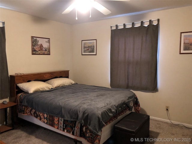 carpeted bedroom with baseboards and ceiling fan