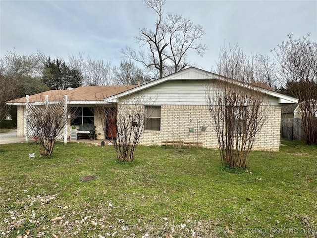 3730 Governor Harris St, Ada, OK 74820 - view of side of property featuring a lawn and brick siding