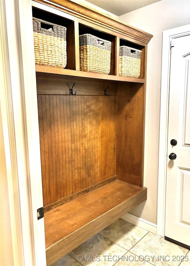 mudroom featuring tile patterned flooring