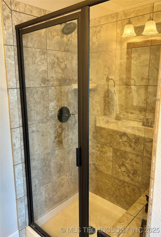 bathroom with a stall shower