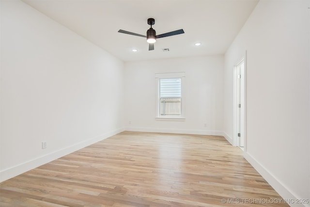 spare room featuring visible vents, baseboards, ceiling fan, recessed lighting, and light wood-style floors