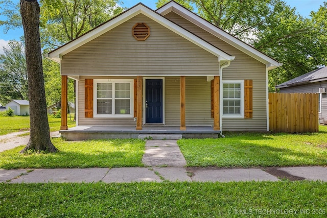311 W 6th, Ada, OK 74820 - bungalow with a porch