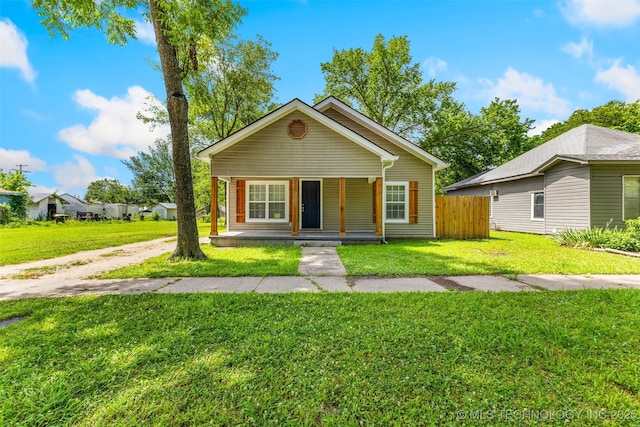 311 W 6th, Ada, OK 74820 - bungalow featuring a porch