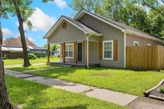 311 W 6th, Ada, OK 74820 - bungalow-style house featuring a porch and roof with shingles