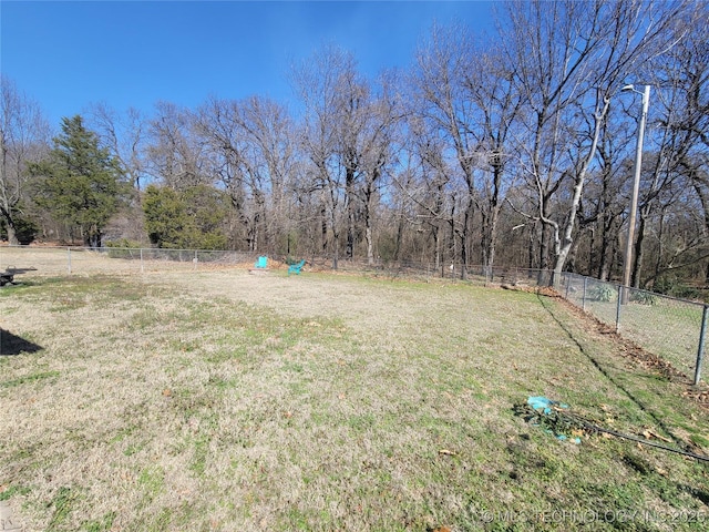 view of yard featuring fence