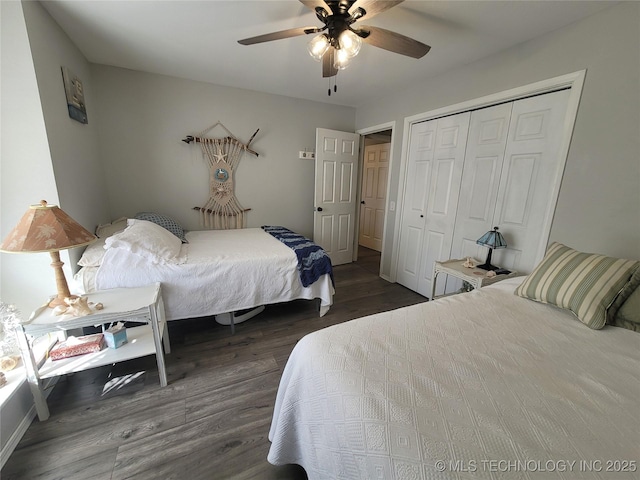 bedroom featuring a closet, wood finished floors, and a ceiling fan