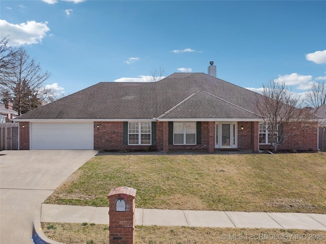 ranch-style house with brick siding, roof with shingles, concrete driveway, and a front lawn