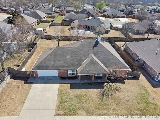 drone / aerial view with a residential view