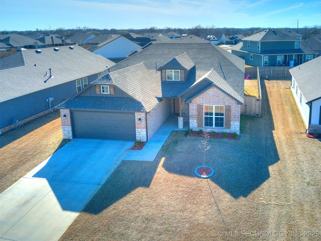 drone / aerial view featuring a residential view