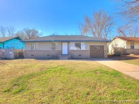 ranch-style home with crawl space, driveway, a front yard, and entry steps