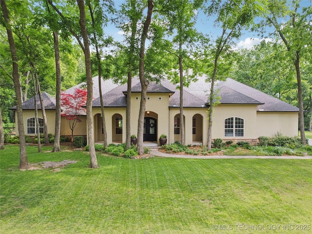 1721 E 136th Pl S, Bixby, OK 74008 - french country inspired facade with stucco siding, a front yard, and a shingled roof