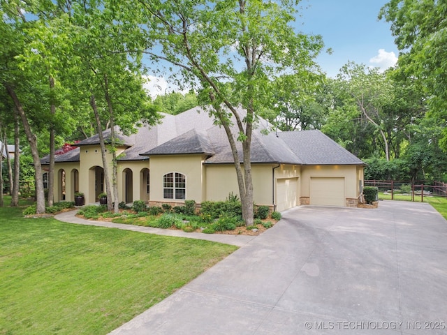 1721 E 136th Pl S, Bixby, OK 74008 - view of front of home with stucco siding, an attached garage, driveway, and stone siding