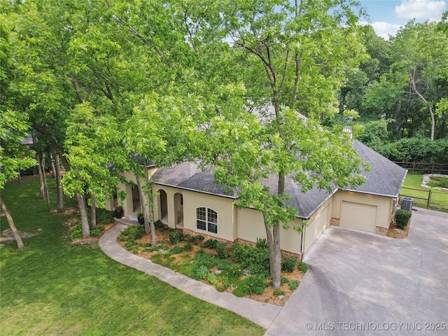 1721 E 136th Pl S, Bixby, OK 74008 - view of front of house featuring stucco siding, asphalt driveway, an attached garage, and stone siding