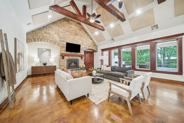 1721 E 136th Pl S, Bixby, OK 74008 - living area featuring high vaulted ceiling, a ceiling fan, beamed ceiling, concrete floors, and a fireplace