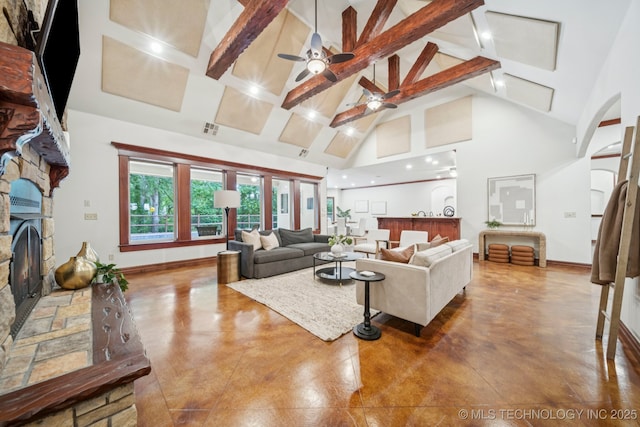 1721 E 136th Pl S, Bixby, OK 74008 - living area with concrete floors, a ceiling fan, a fireplace, high vaulted ceiling, and beam ceiling