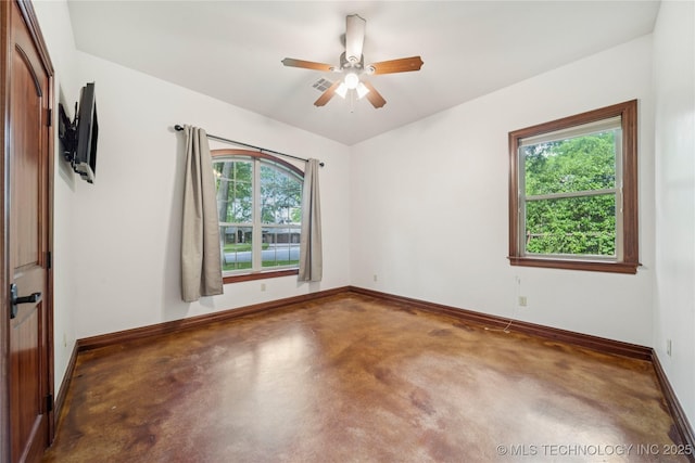 1721 E 136th Pl S, Bixby, OK 74008 - unfurnished room featuring concrete flooring, baseboards, and ceiling fan