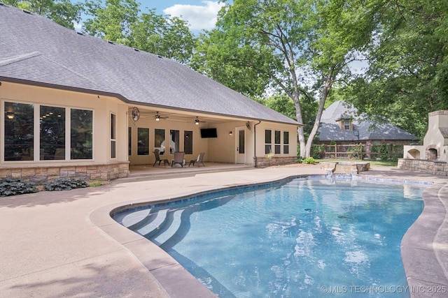 1721 E 136th Pl S, Bixby, OK 74008 - view of pool with an outdoor stone fireplace, a patio, and ceiling fan