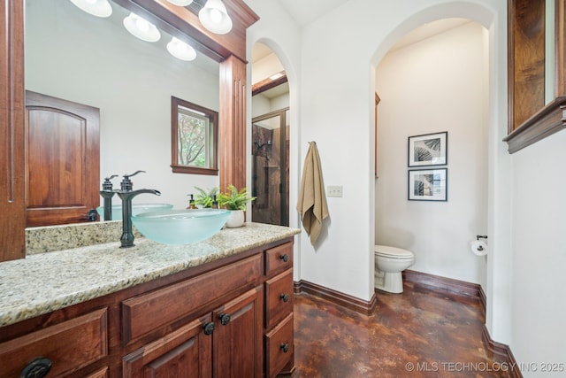 1721 E 136th Pl S, Bixby, OK 74008 - bathroom with finished concrete flooring, vanity, and an enclosed shower