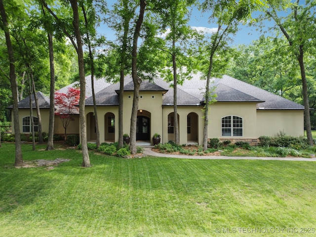 1721 E 136th Pl S, Bixby, OK 74008 - view of front facade with stucco siding, a front lawn, and roof with shingles