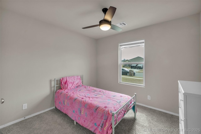 bedroom with visible vents, carpet flooring, a ceiling fan, and baseboards